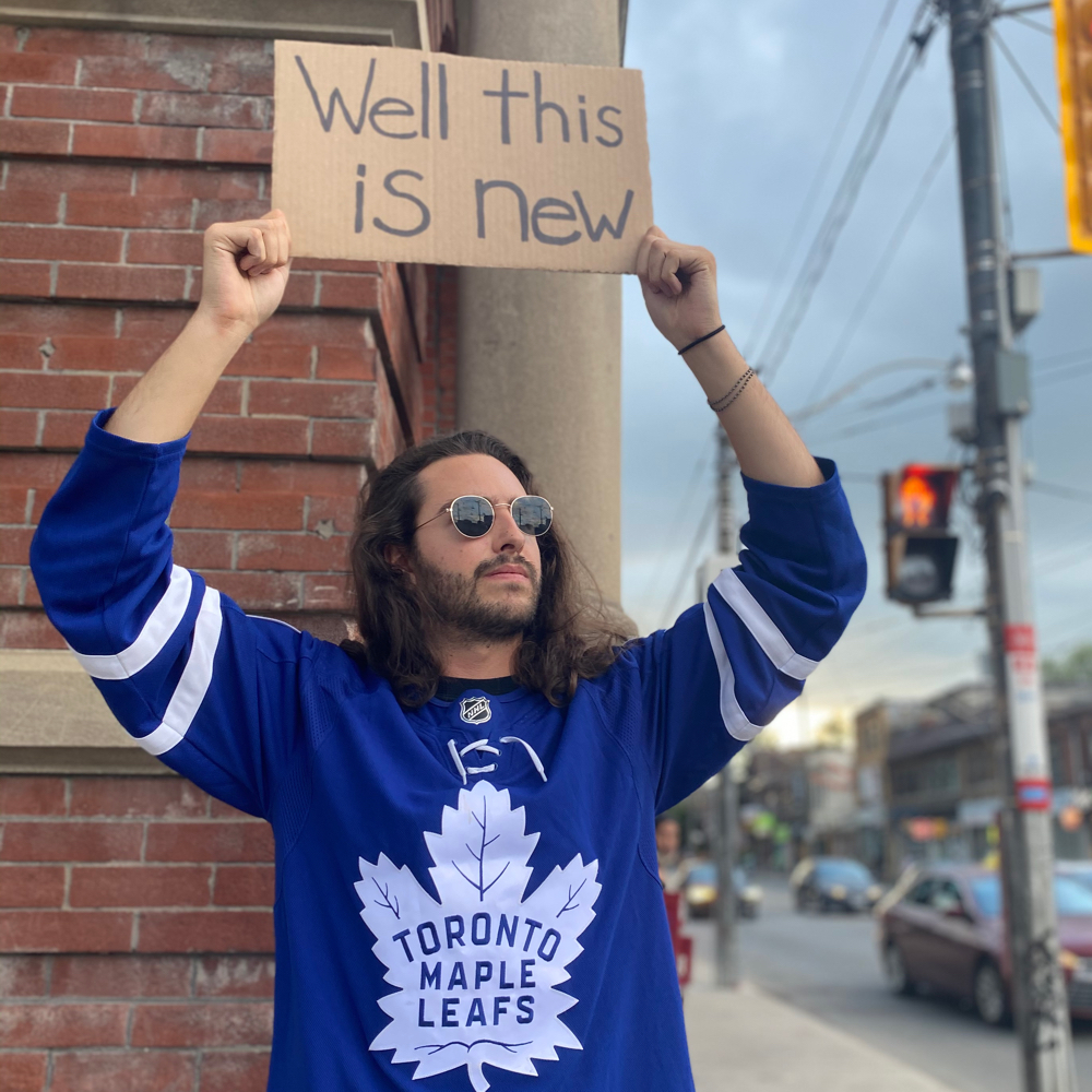 Dude With Sports Sign