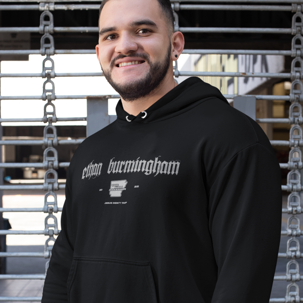 “The Arm Assassin” 2022 by Ethan Burmingham Hoodie, White Logo