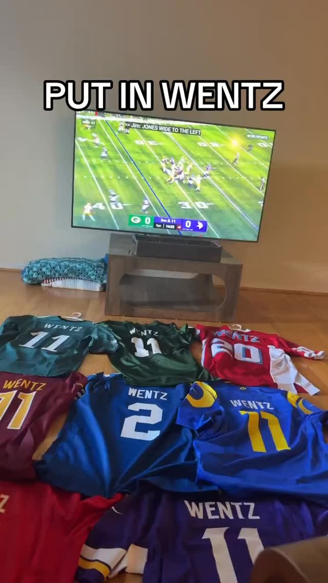 A collection of Wentz jerseys displ...