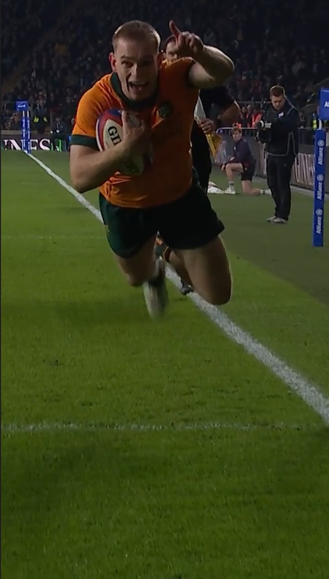 Wallabies player scores a try at Al...