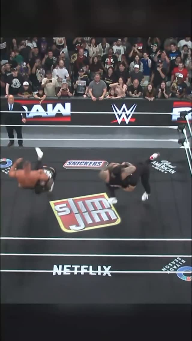Double spear during a wrestling mat...
