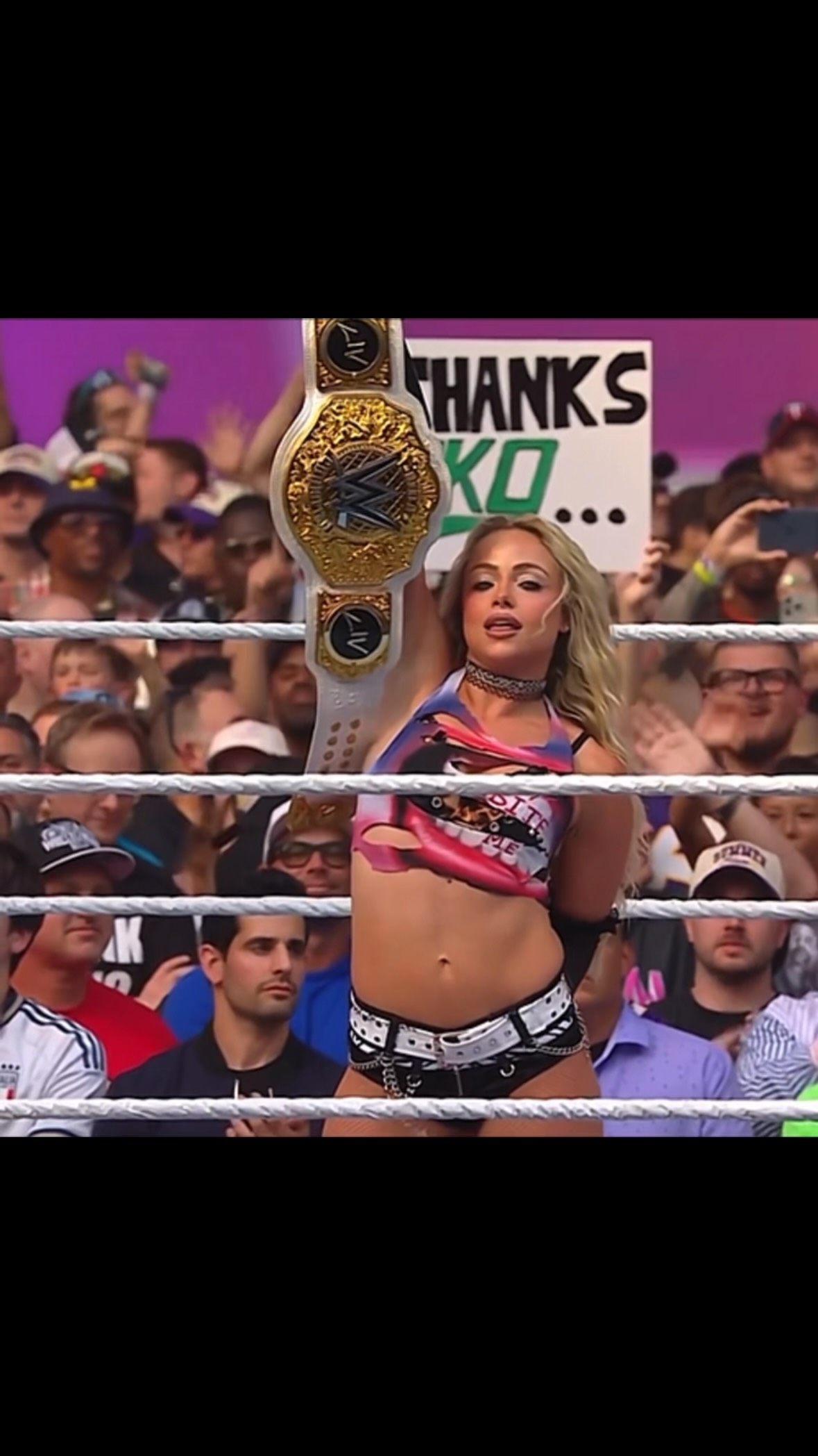Liv Morgan celebrates after success...