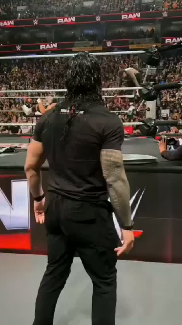 Roman Reigns enters the ring at a W...