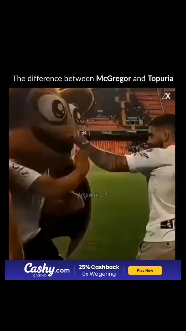 Ilia Topuria punches a mascot