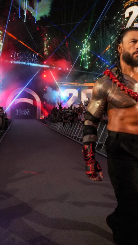 Roman Reigns enters the ring with p...