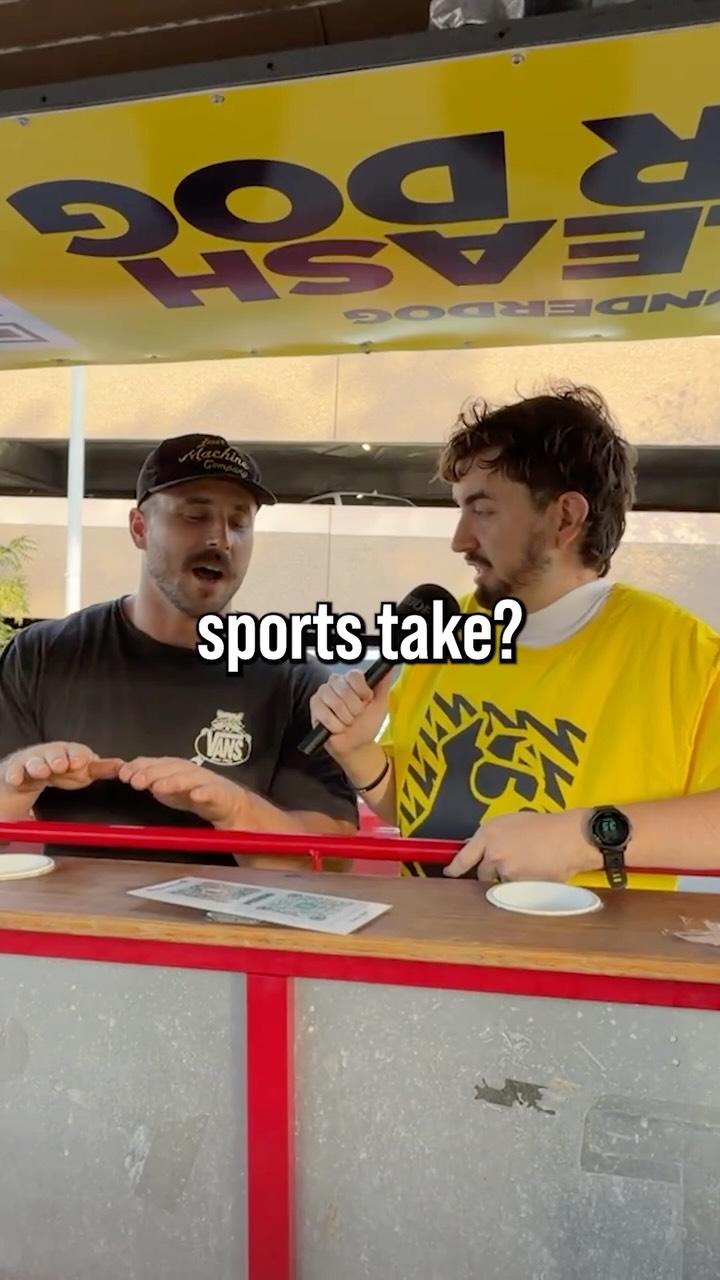 Two men discussing sports takes