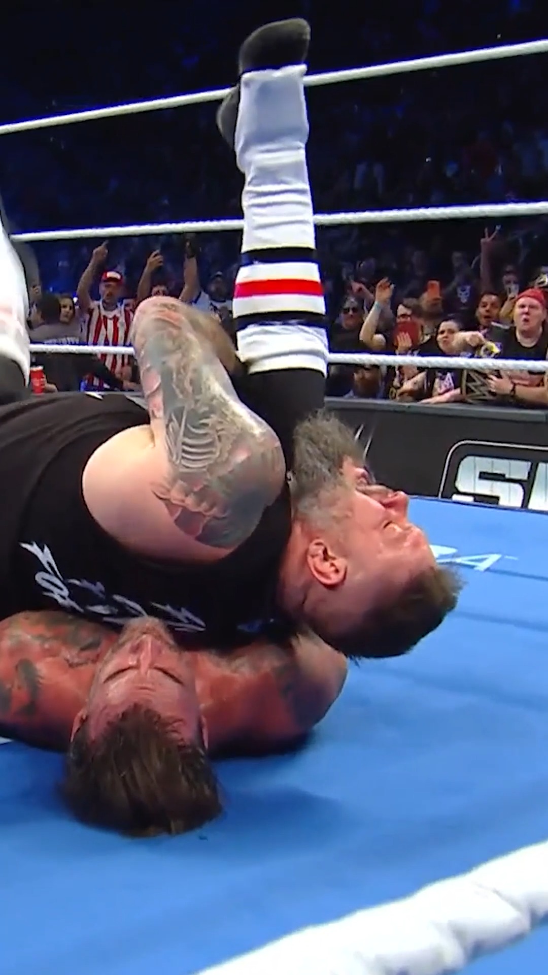 Wrestler being pinned in the ring