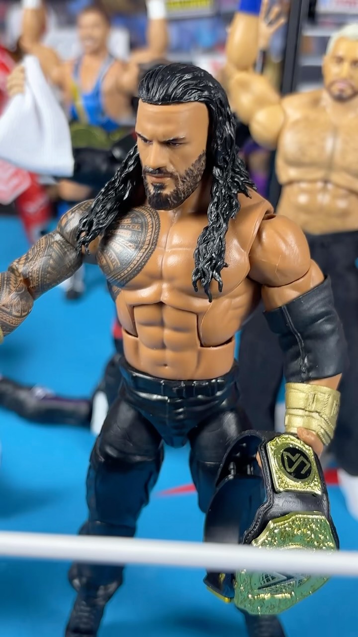 Roman Reigns WWE action figure with...