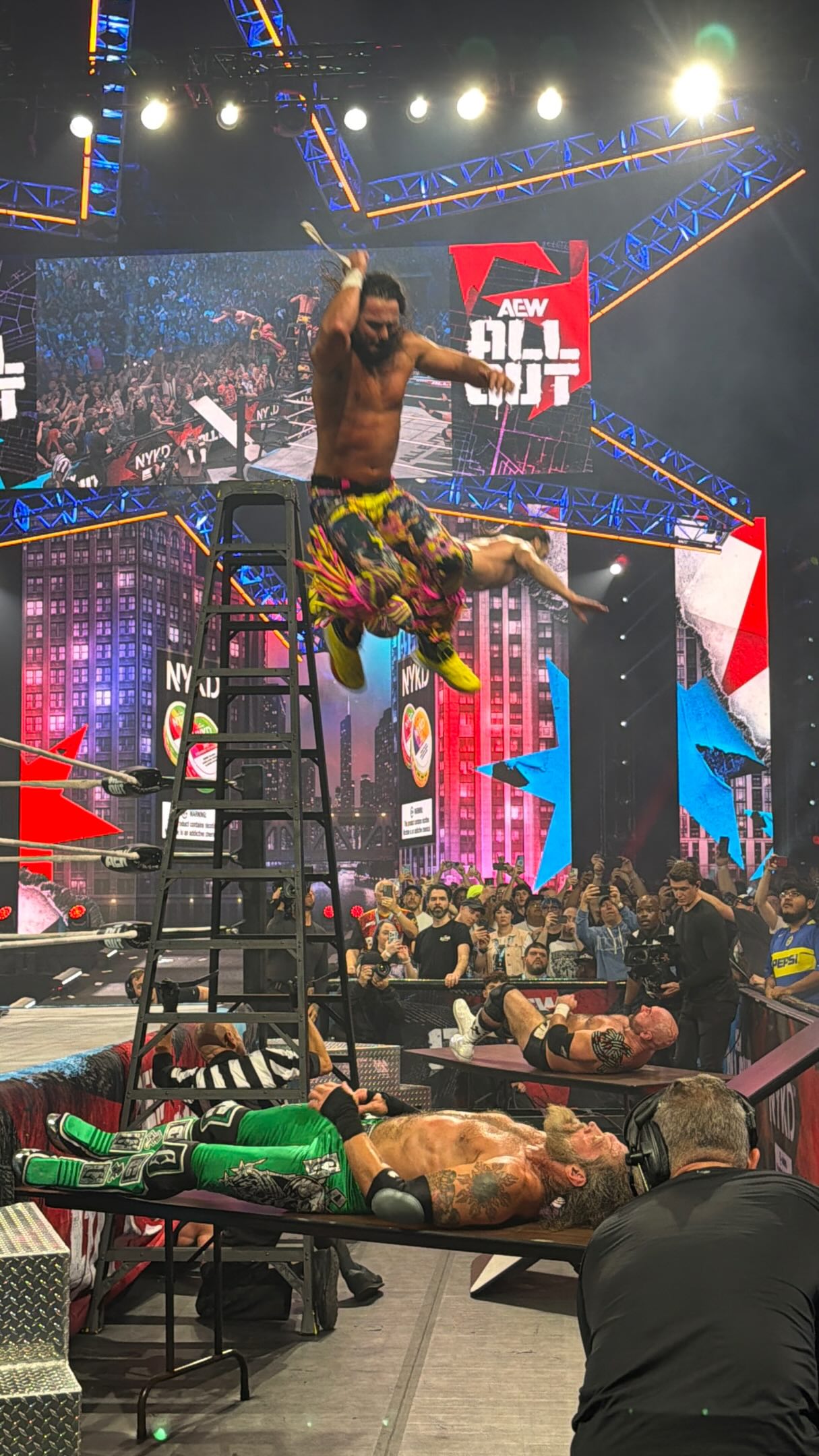 The Young Bucks drop elbows off lad...