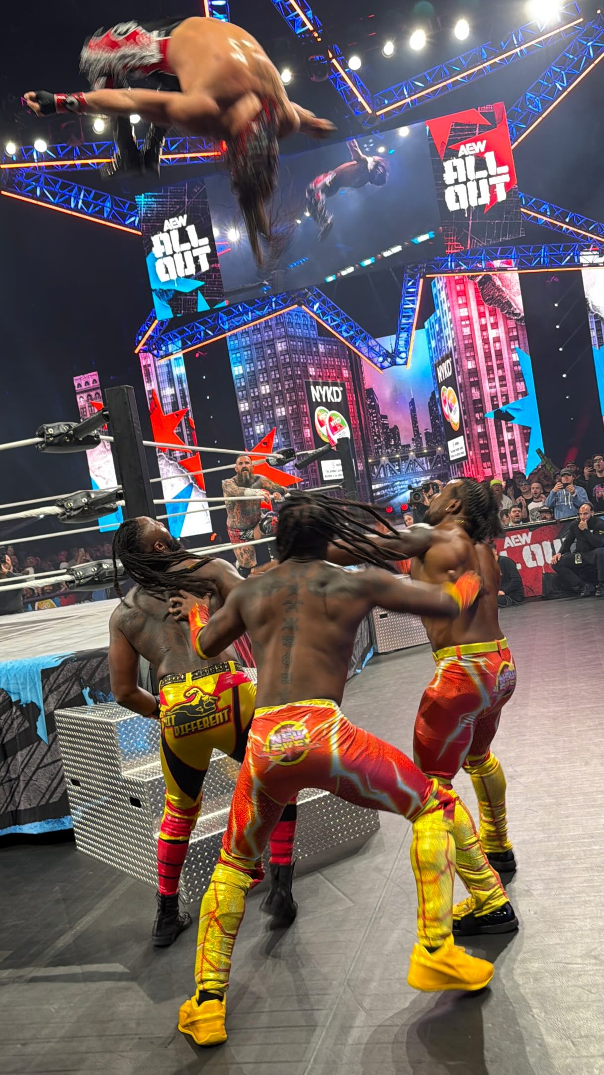 Bandido flies above the ring at AEW...