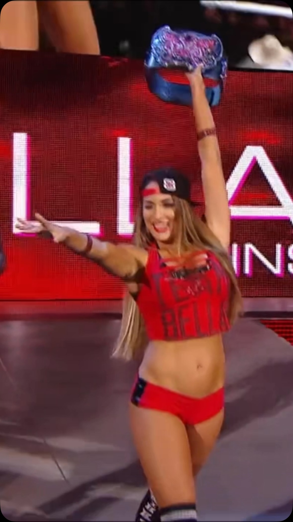 Nikki Bella celebrates with her Div...