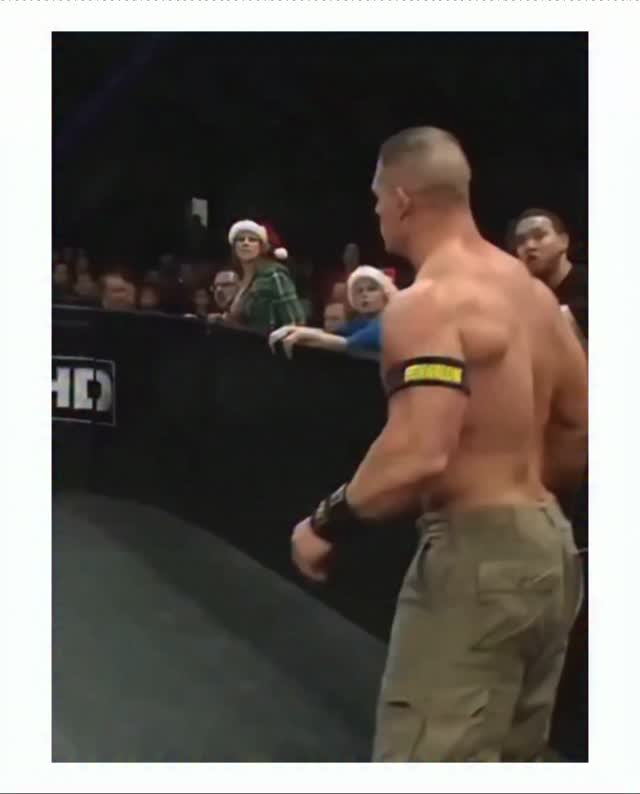 John Cena in the ring as fans wear ... on MILLIONS John Cena in the ring as fans wear ...