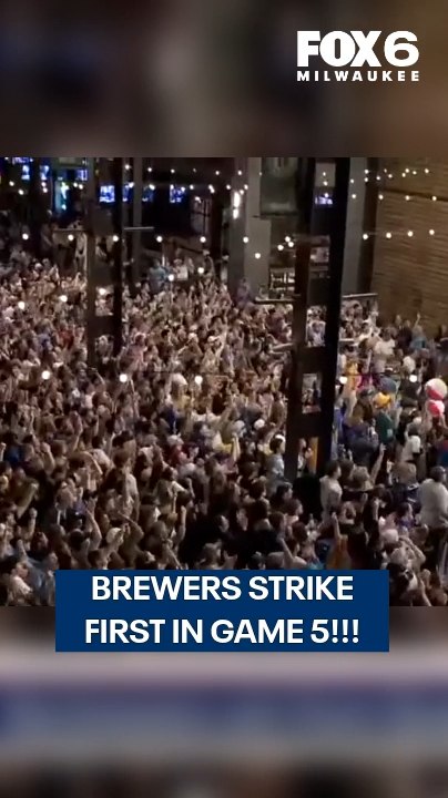 Brewers fans celebrate as Cooper Pr...