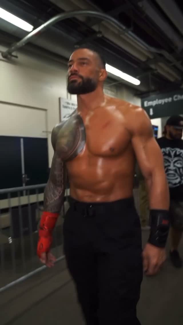 Roman Reigns walking backstage