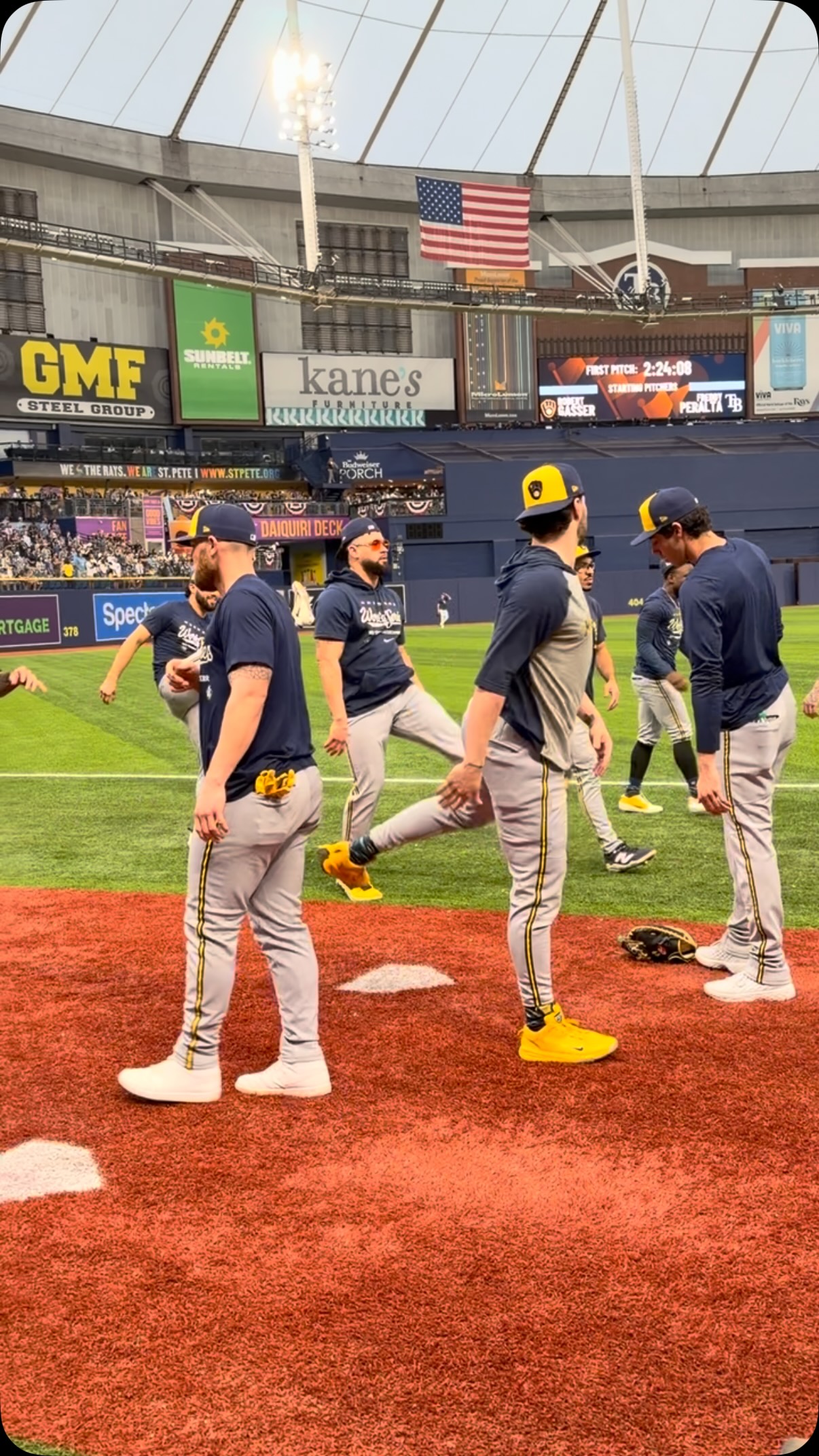 Brewers players stretch on the fiel...