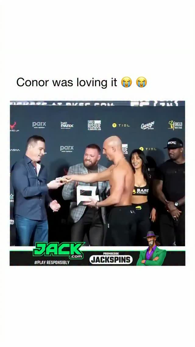 Conor McGregor on stage overseeing ...