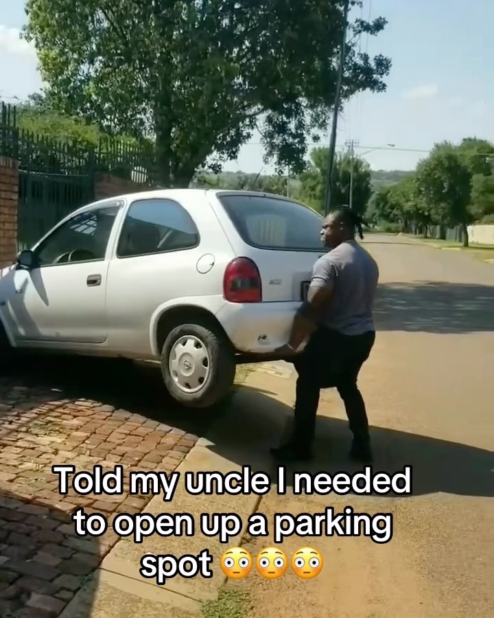 Man lifts a car to make a parking s... on MILLIONS Man lifts a car to make a parking s...