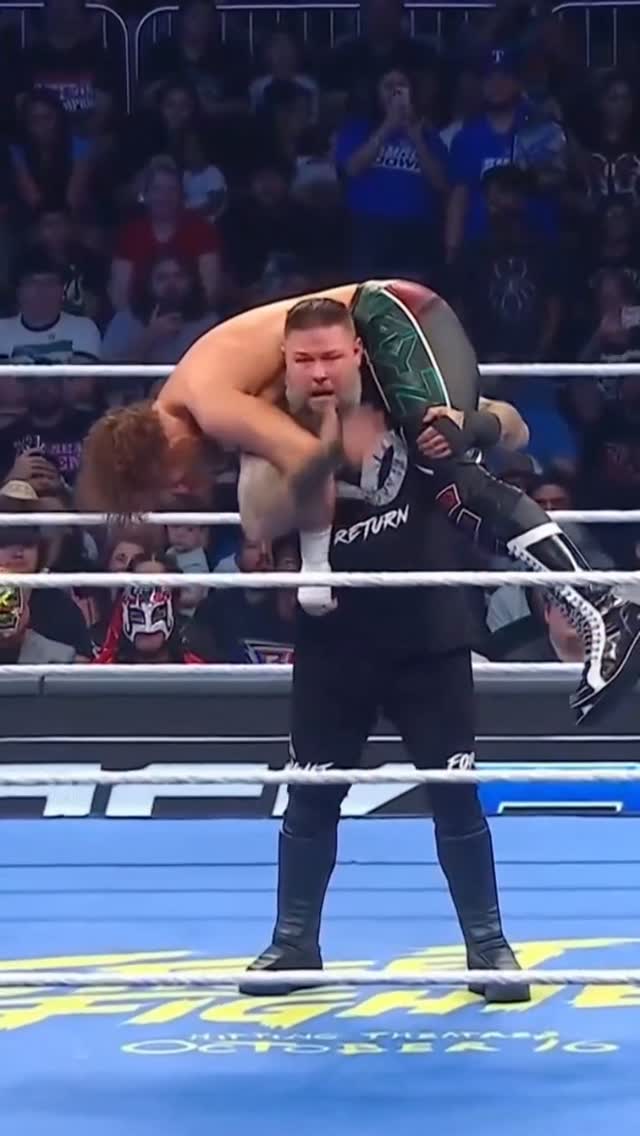 Kevin Owens powerslams an opponent ...