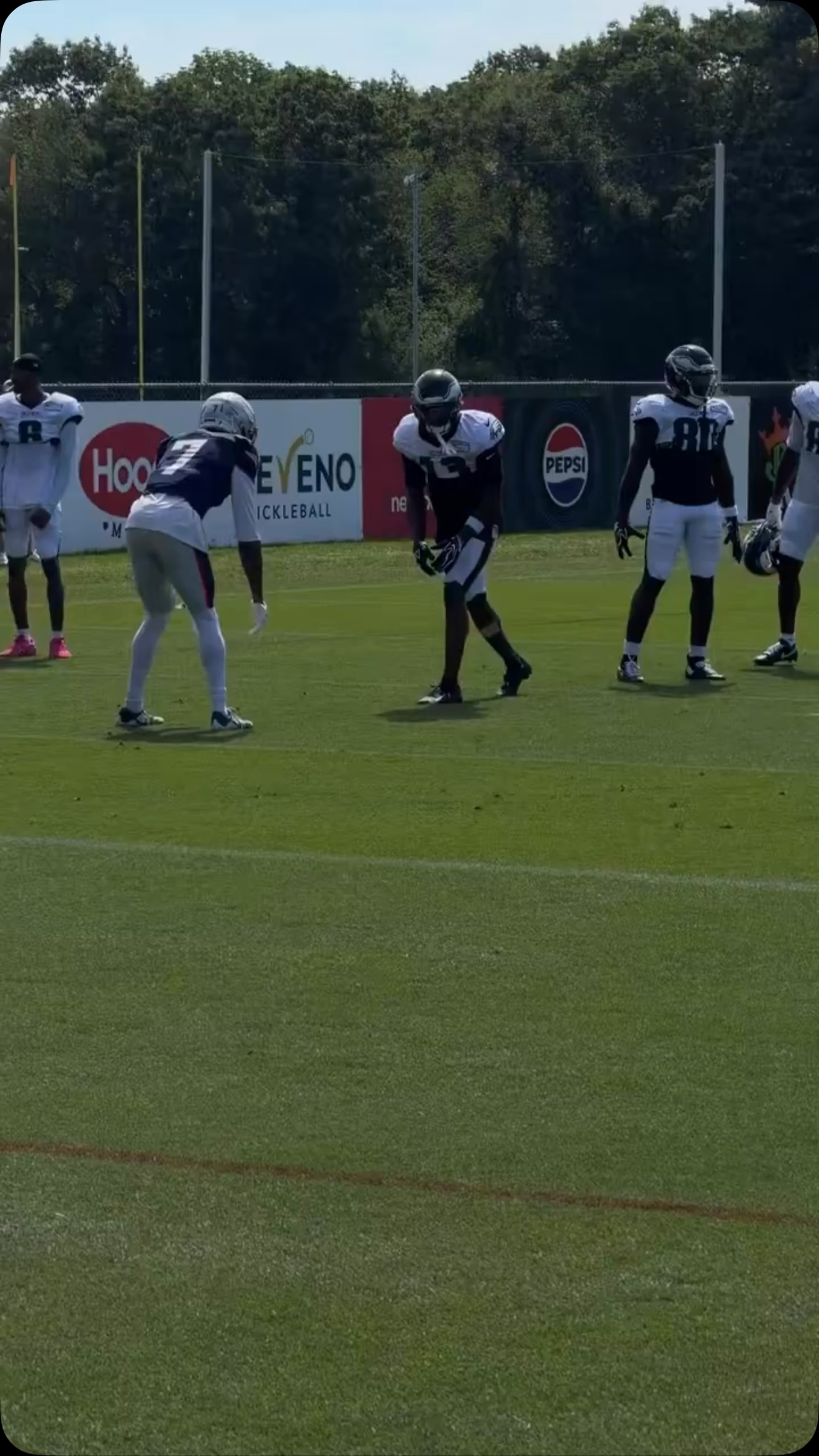Dontayvion Wicks working on the fie...