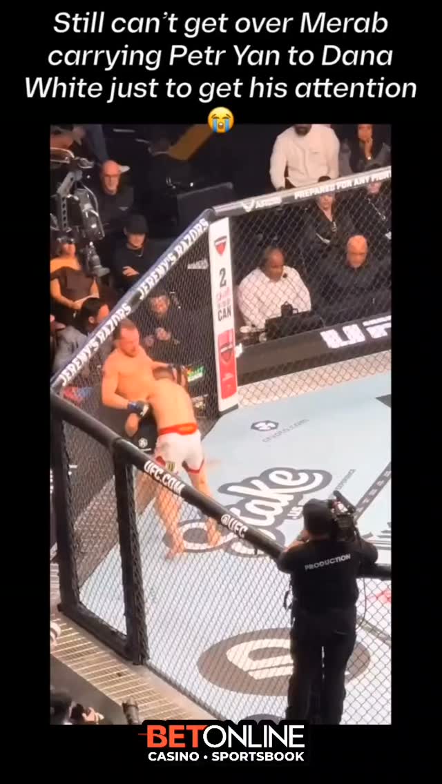 Merab Dvalishvili carries Petr Yan ...