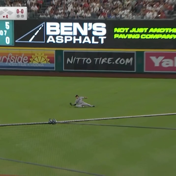 Spencer Jones makes a sliding grab ...