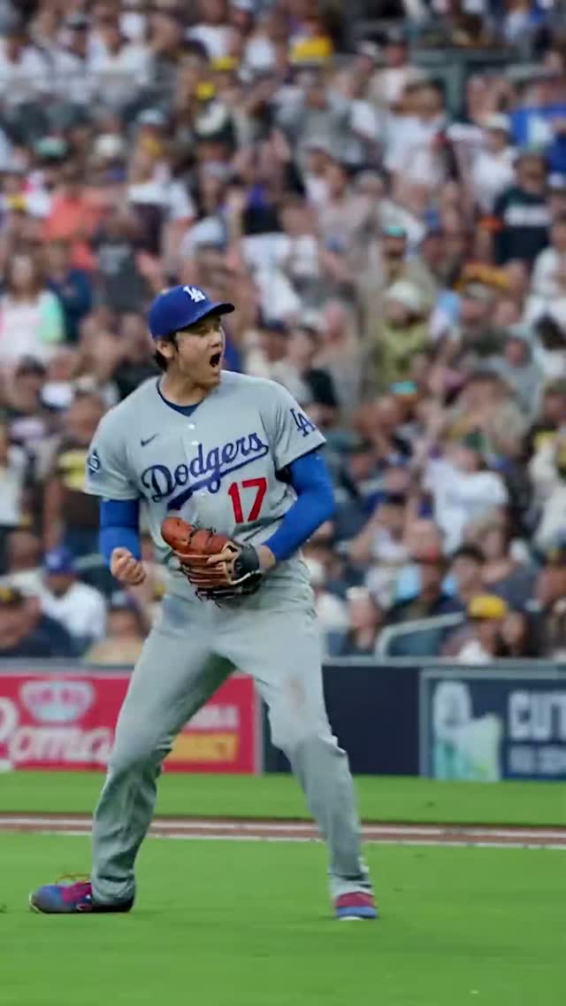 Dodgers player celebrating on the f...