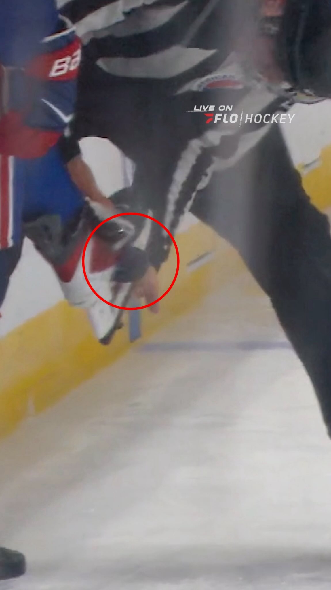 Puck stuck in skate during hockey g...
