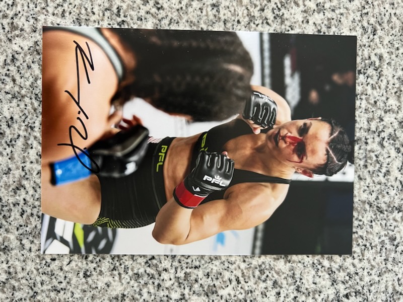 "Action" Photo, Signed by Kaytlin "Katniss" Neil