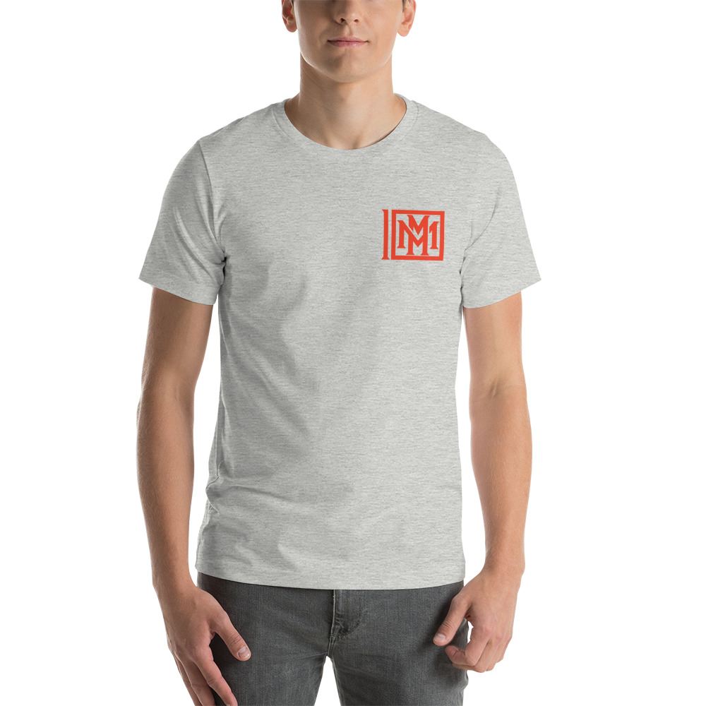 Miguel Mitchell by MAWI Tee , Orange Logo on MILLIONS Miguel Mitchell by MAWI Tee , Orange Logo